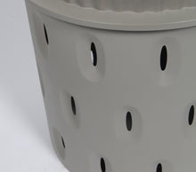 holes on the bottom of a Pet Poo Worm Farm